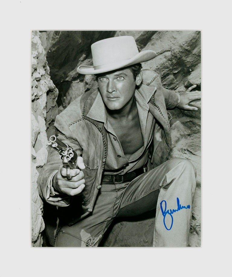 Item #59862 Signed Roger Moore Still from the film 'Gold of the Seven Saints' (1961). Roger MOORE, Sir.