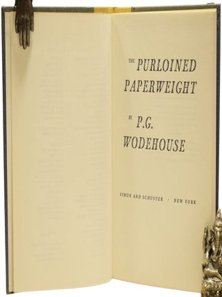 The Purloined Paperweight.