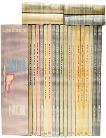 Item #72161 Dollar Mystery Guild Uniform edition of the James Bond novels. A complete set, with multiple variant copies. Comprising Casino Royale, Moonraker, From Russia With Love, Dr. No, Goldfinger, Thunderball, The Spy Who Loved Me, You Only Live Twice and The Man with the Golden Gun (all that were published). Ian Lancaster FLEMING.