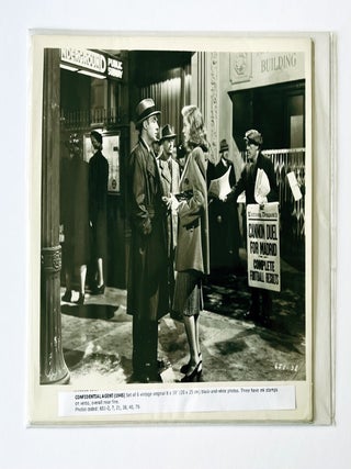 The Confidential Agent. US Film advertising stills. Group of black & white press photographs, with softcover book.