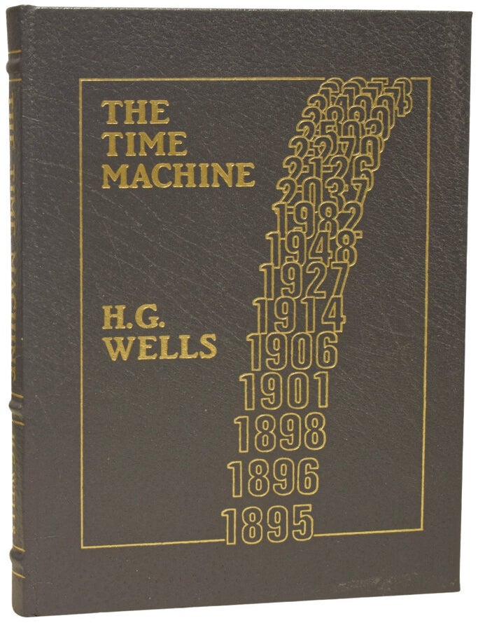 Item #76341 The Time Machine. H. G. WELLS, Herbert George, Joe MUGNAINI, Brian ALDISS, introduction.